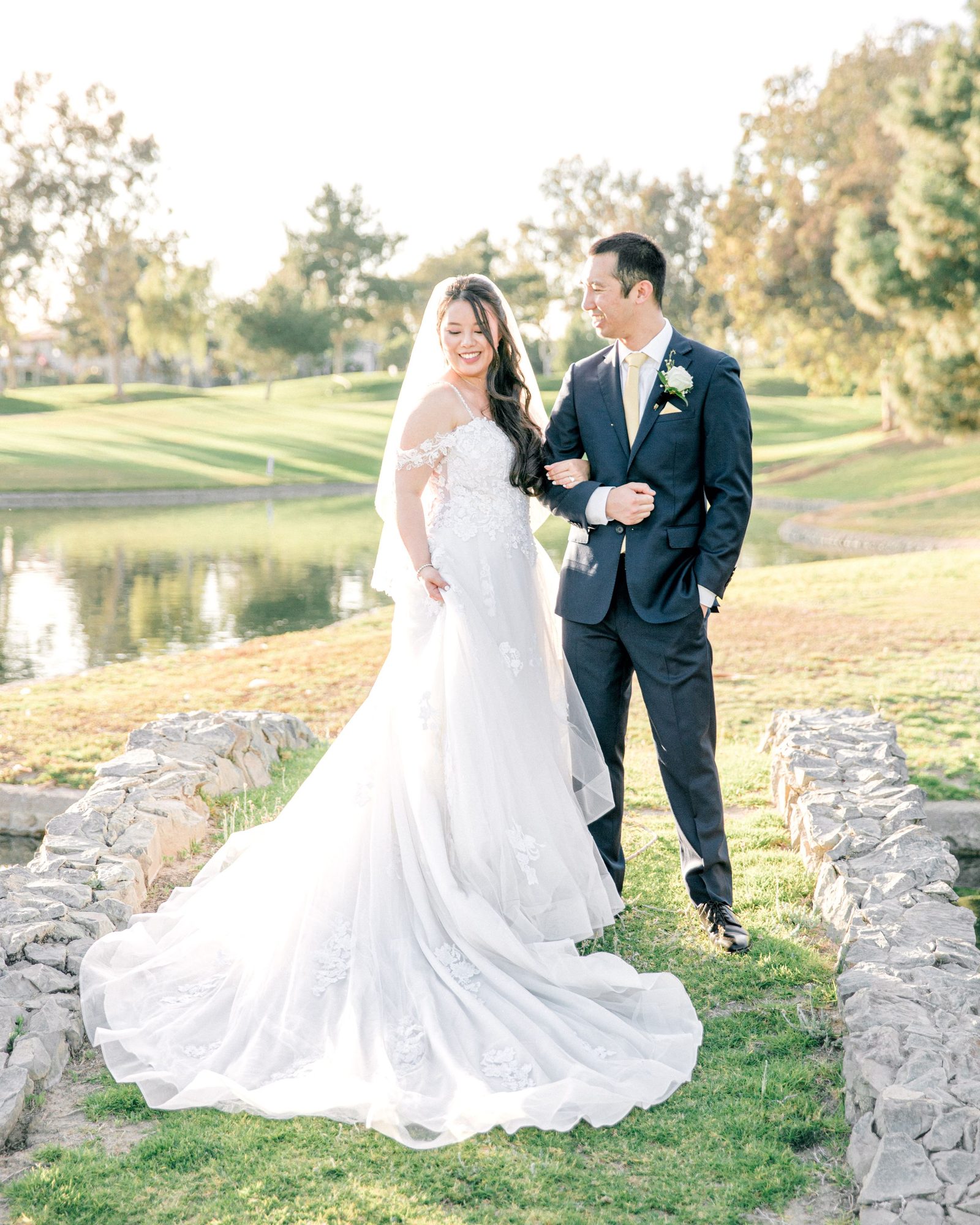 Couple by a pond