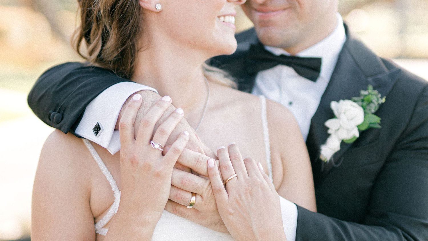 Hands and wedding rings close up