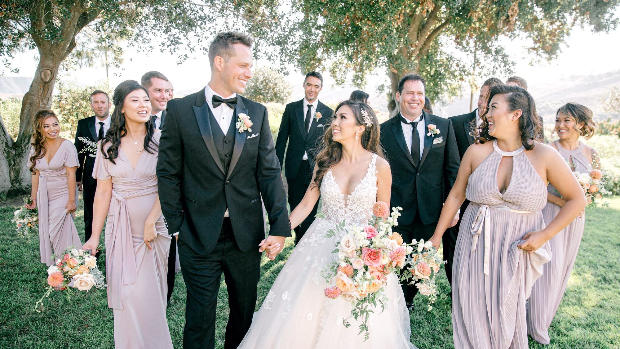 Bridal party laughing together
